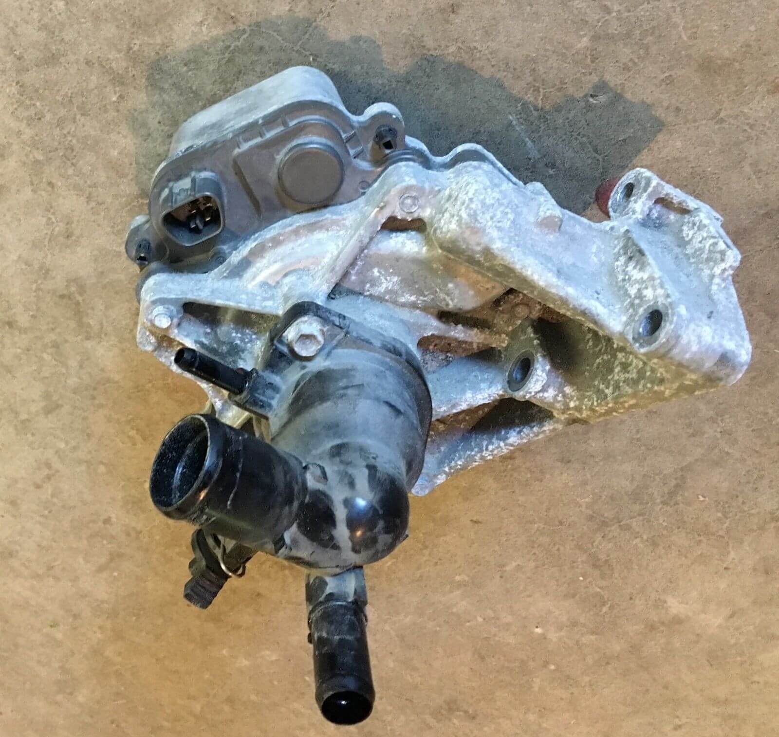Used OEM 2012-2014 Toyota Prius C Water Pump with Coolant Thermostat Housing OEM