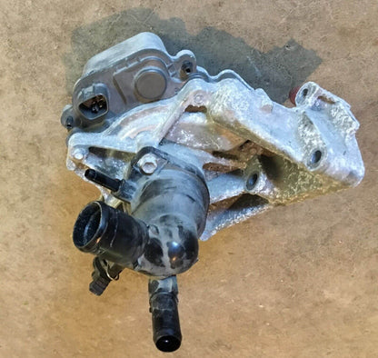 Used OEM 2012-2014 Toyota Prius C Water Pump with Coolant Thermostat Housing OEM