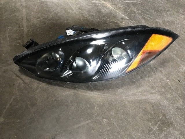 Used OEM 1999-2000 Mercury Cougar Headlight Left OEM