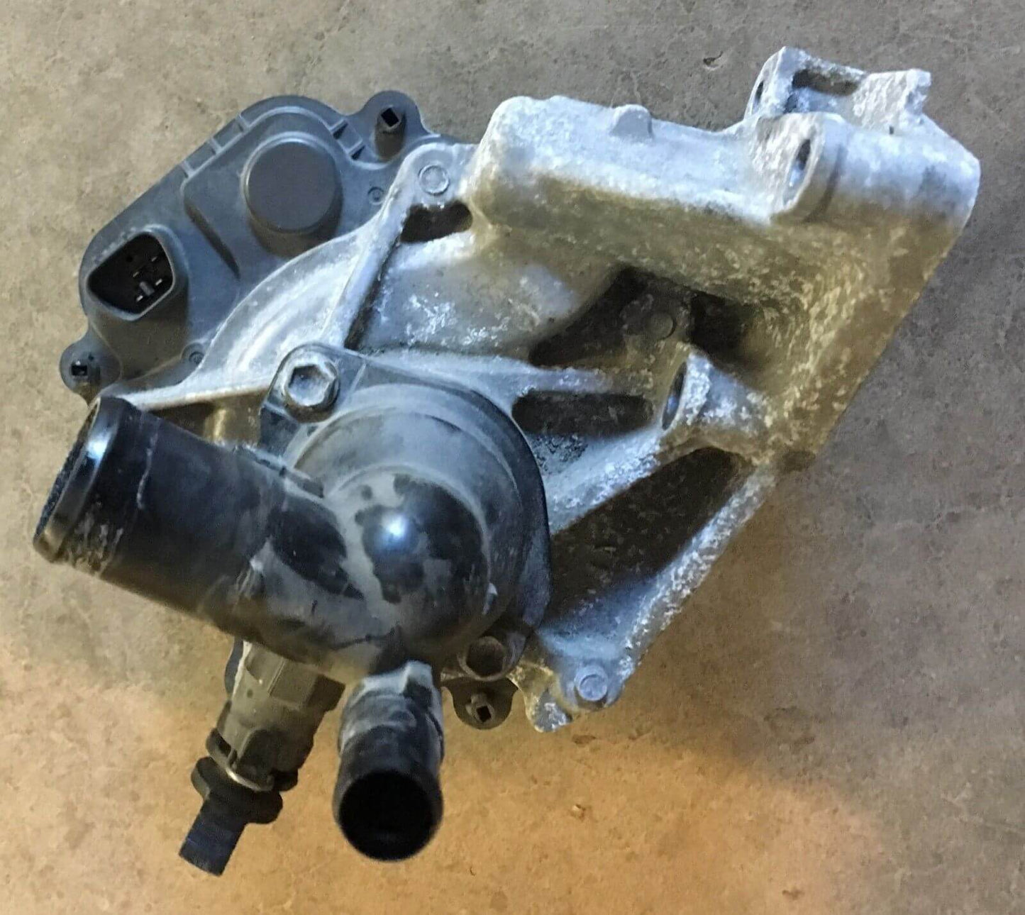 Used OEM 2012-2014 Toyota Prius C Water Pump with Coolant Thermostat Housing OEM