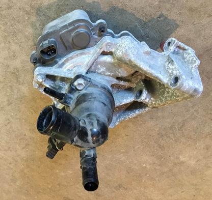 Used OEM 2012-2014 Toyota Prius C Water Pump with Coolant Thermostat Housing OEM